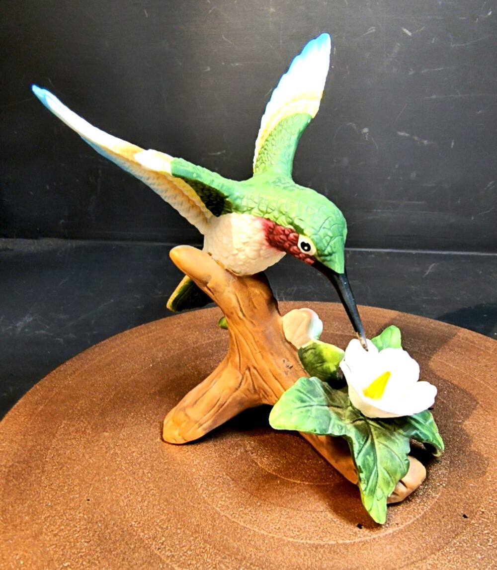2133. Hummingbird Figurine Hand Painted Bisque Porcelain Branch Pink Flowers